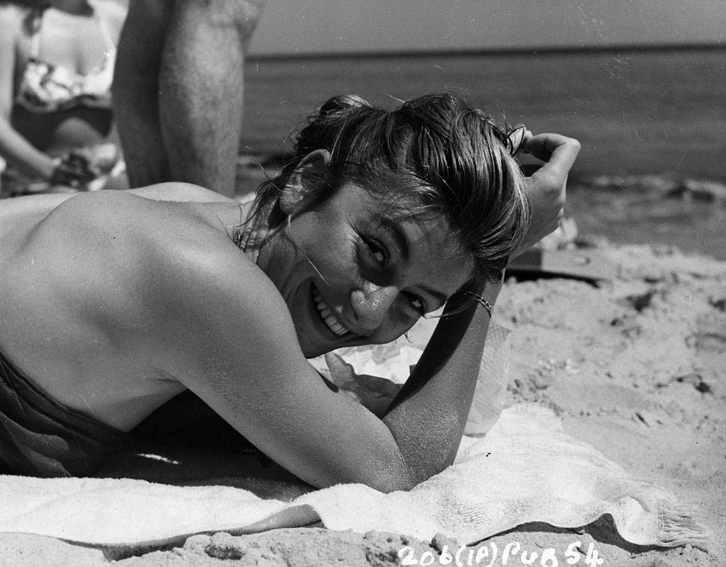 #39 Anouk Aimee with Serge Reggiani, Cecile Aubry, Orson Welles and Michel Auclair, 1949.