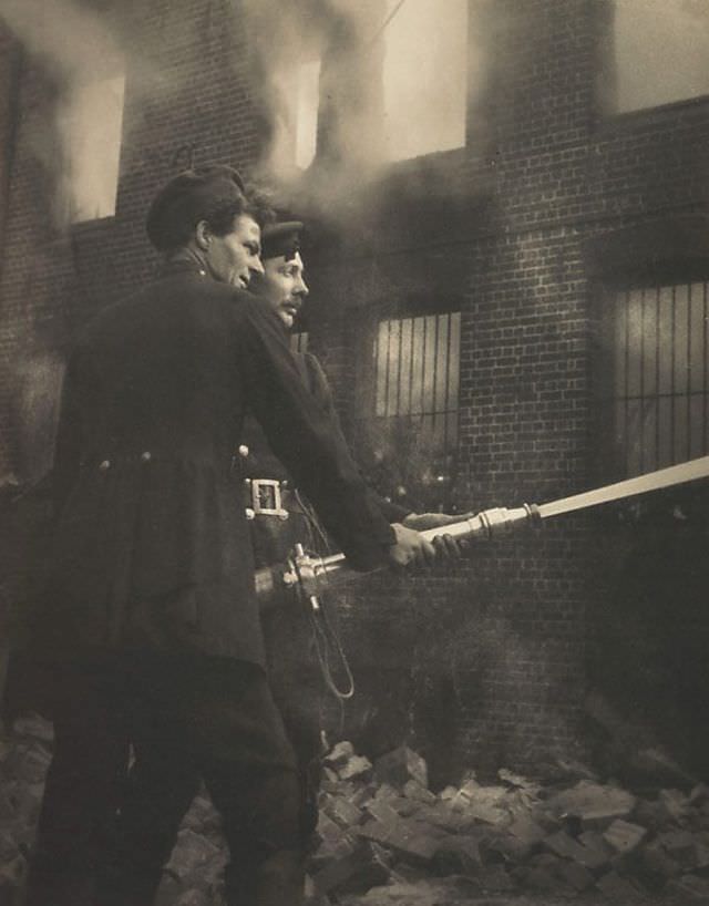 #28 Boys with hose, fire at Redfern, 1919