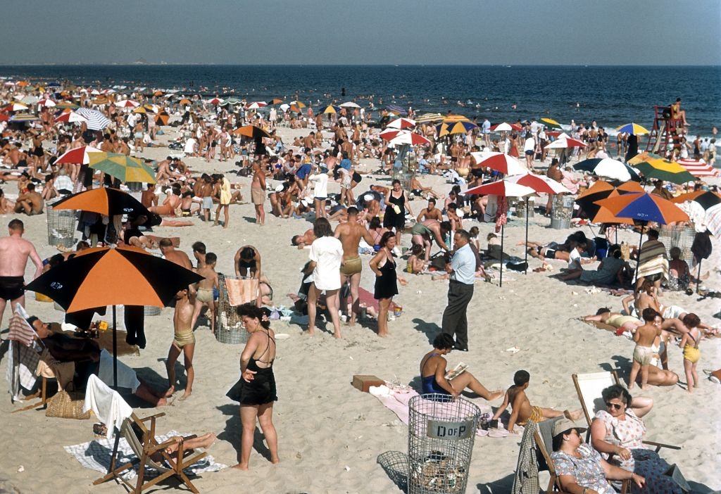 #18 Sunbathers on Coney Island beach, 1948.