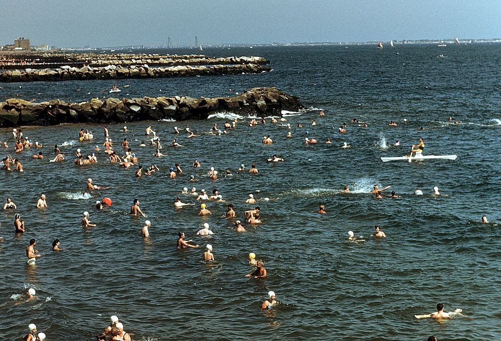 #20 Swimmers frolic in the ocean off Coney Island beach, 1948.