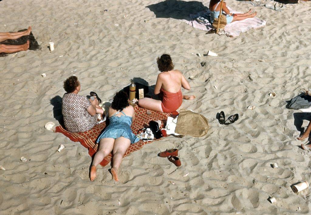 #28 Sunbathers on Coney Island beach circa 1948.
