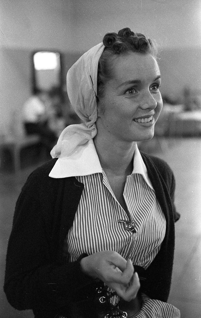 #32 Debbie Reynolds smiles on the lot of MGM studios, 1948.
