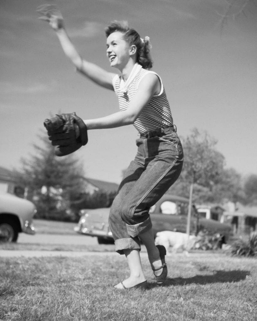 #7 Debbie Reynolds playing baseball, 1951.