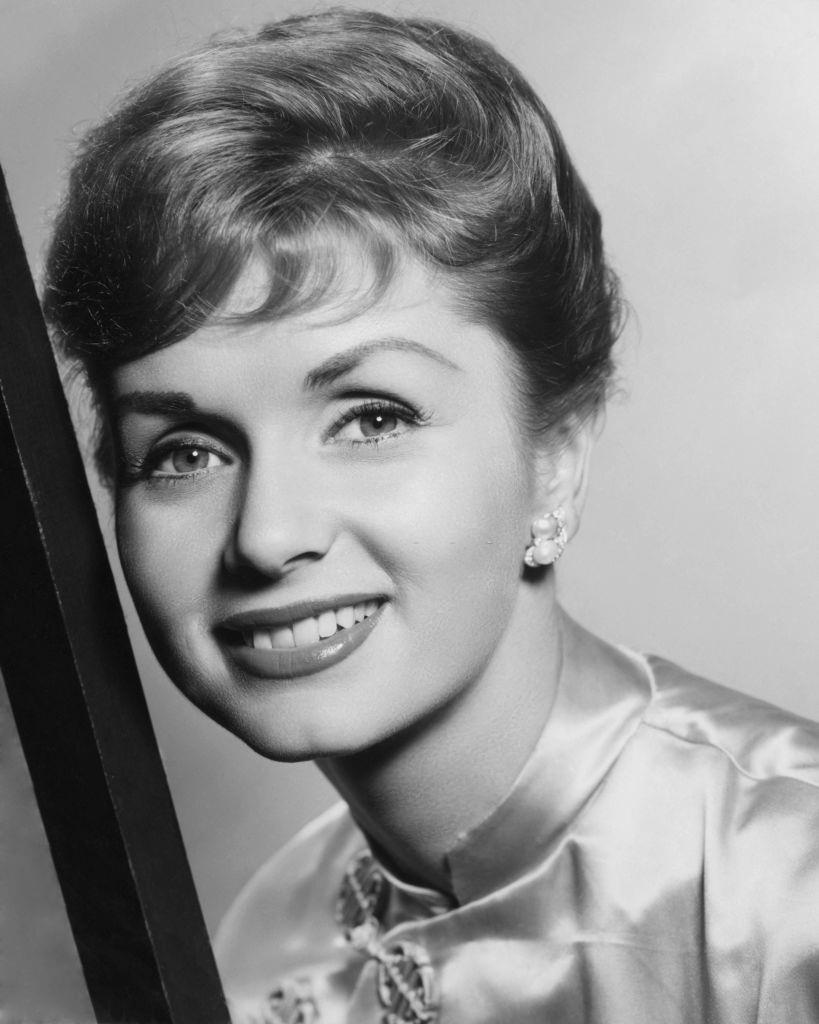 #34 Debbie Reynolds pictured smiling in a publicity portrait, 1950.