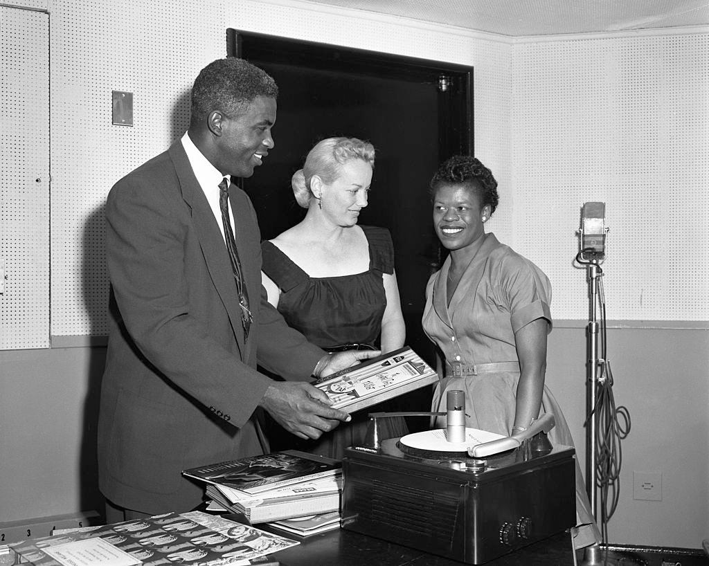 #30 Baseball player Jackie Robinson, host Faye Emerson and a contestant, 1953.