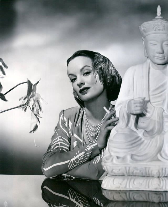 #41 Faye Emerson with a statue, 1950s.