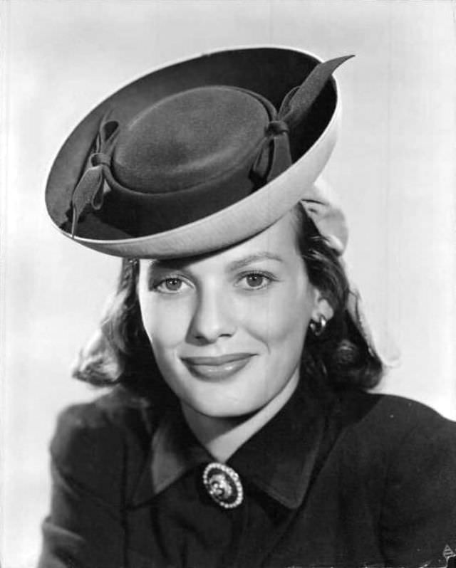 #48 Faye Emerson wearing a hat, 1950s.