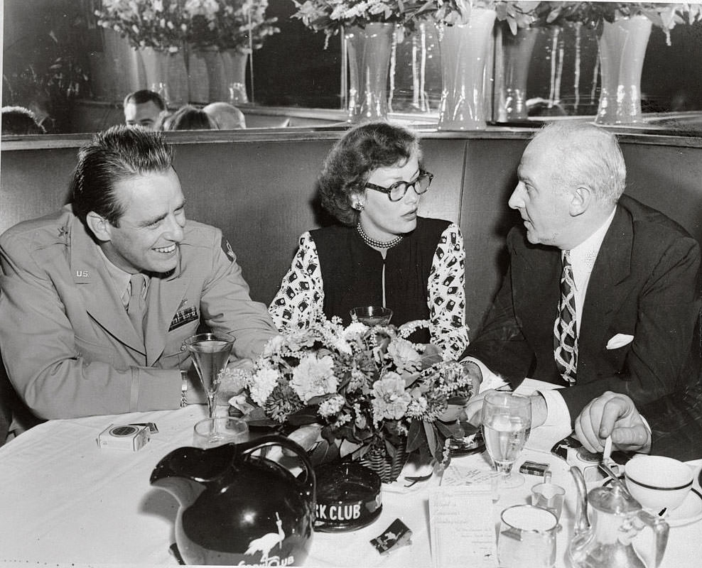 #8 Faye Emerson with Elliott Roosevelt and Walter Winchell Sitting at Table, 1945.