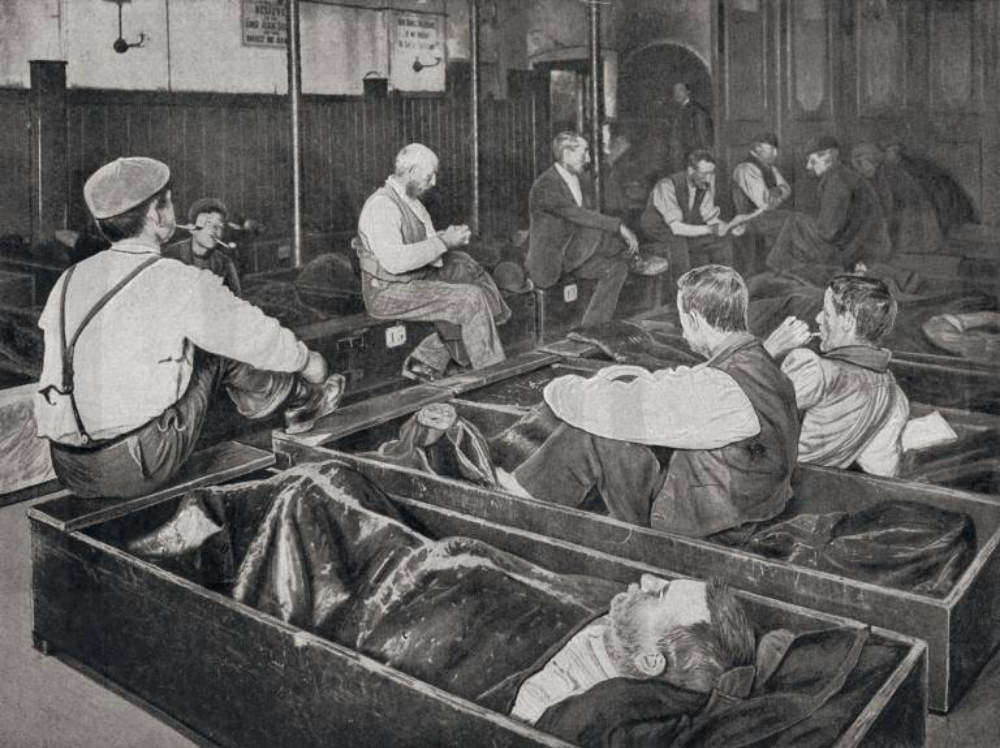#2 Men at the four penny coffin, aka coffin house, ca. 1901.