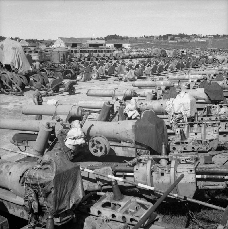 #11 A collection of German military equipment including artillery pieces, searchlights, tanks and lorries at Solar aerodrome, Stavanger.
