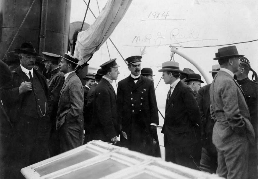 #8 Customs Inspector Malcolm Reid boards the ship with officials and journalists.