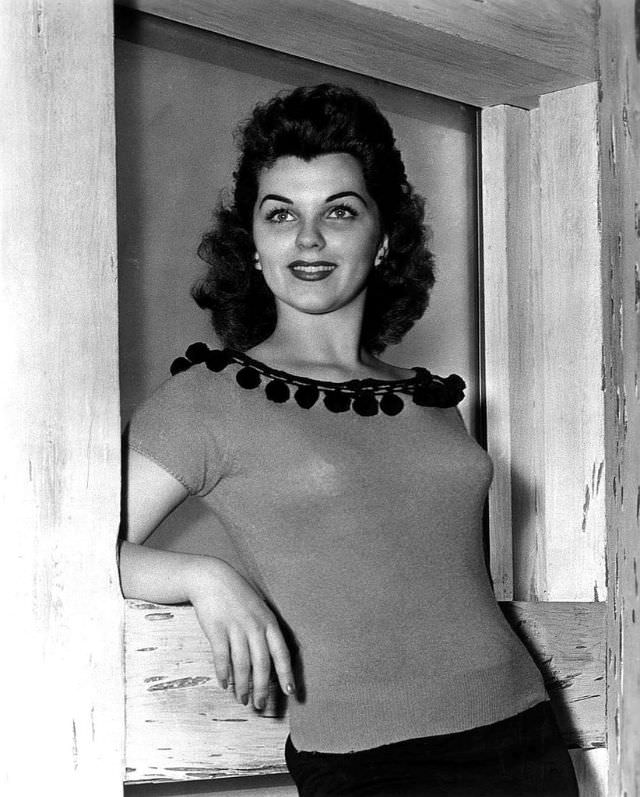 #32 Lisa Gaye posing posing in a bathing suit, 1950s.