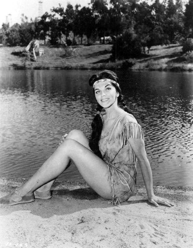 #48 Lisa Gaye on the bank of a Pond.