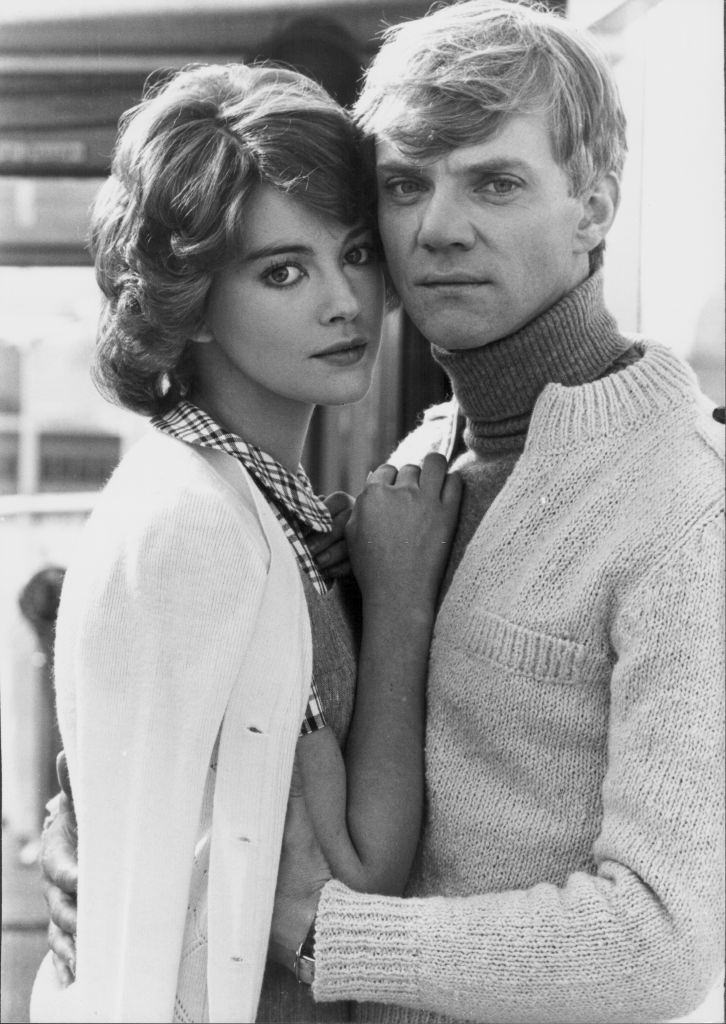 #17 Lynne Frederick and Malcolm McDowell, as they appear in the film ‘Voyage of the Damned’, 1976.