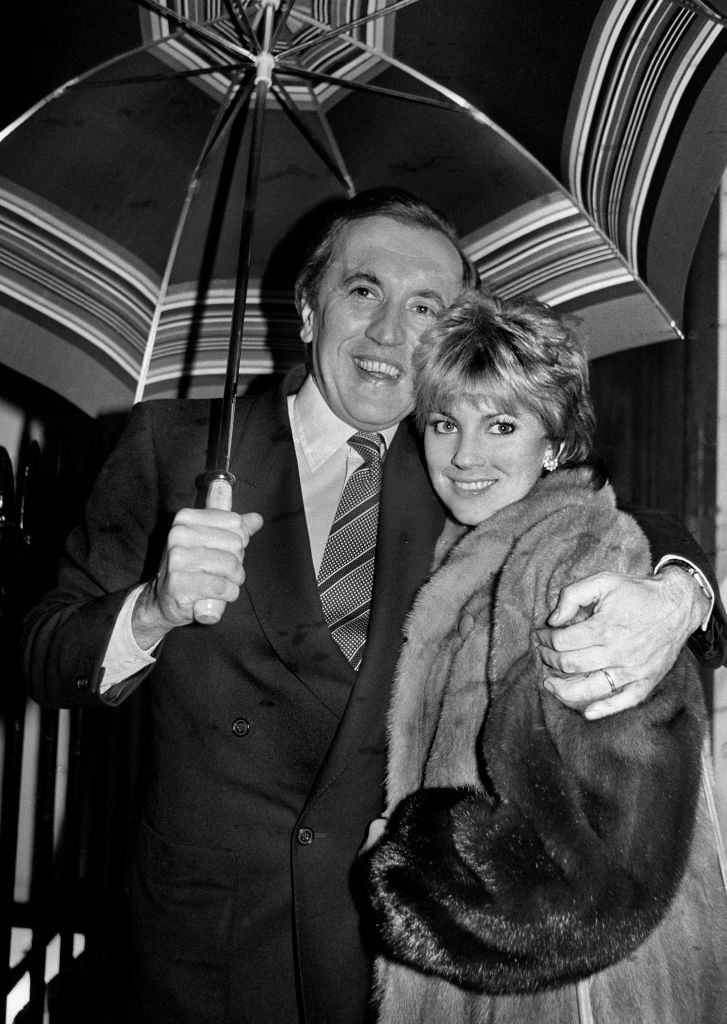 #36 Lynne Frederick with her second husband David Frost in London, 1981.