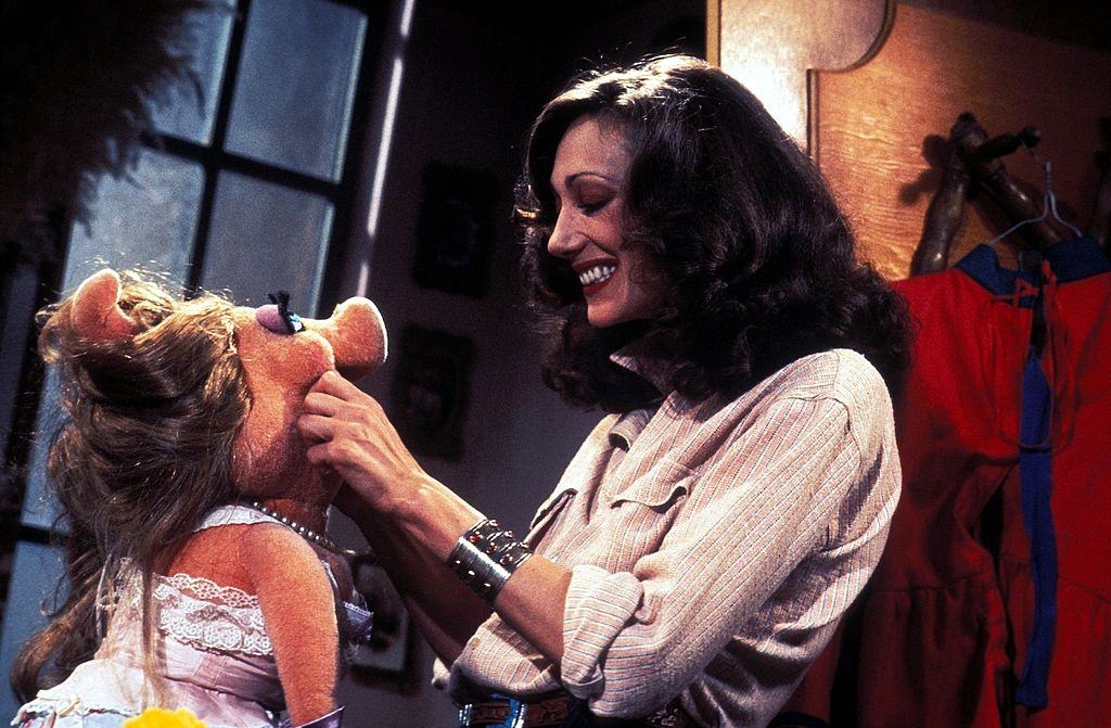 #57 Marisa Berenson with Muppet Show character Miss Piggy during filming of The Muppet Show in 1978.