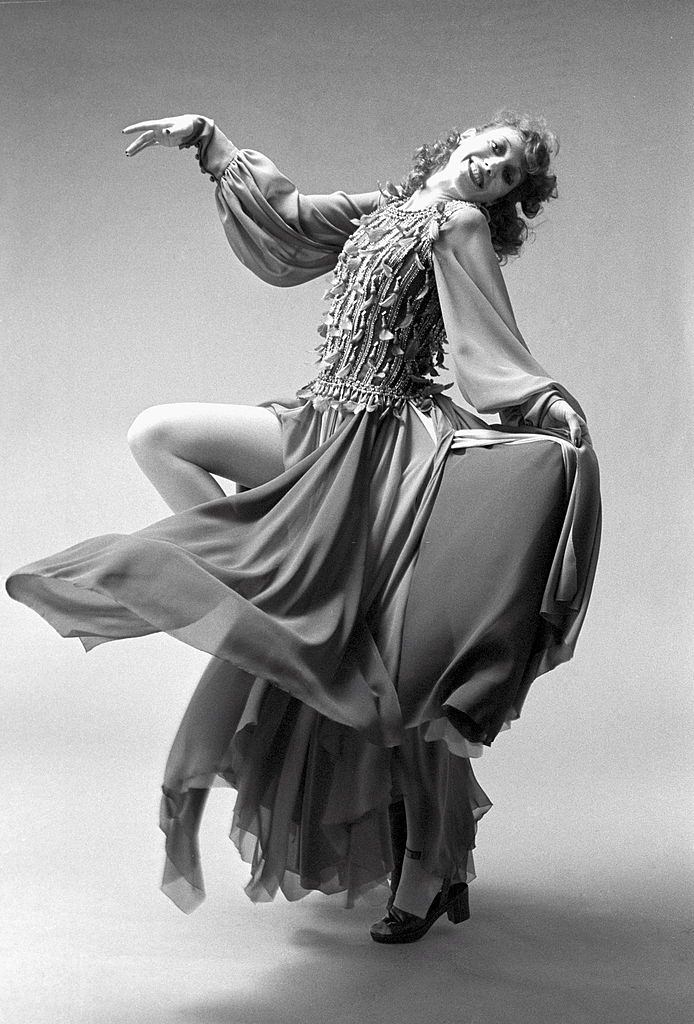 #9 Marisa Barenson dress with petals, the skirt is made of tricolor, red, green and purple muslin sections