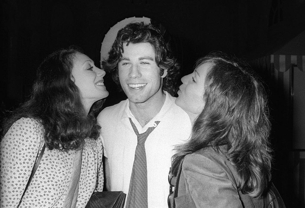 #62 Marisa Berenson with John Travolta and Versailles, 1978.