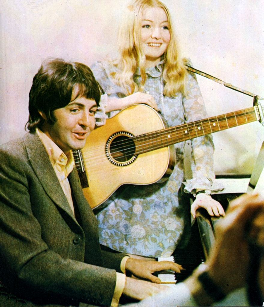 #12 Mary Hopkin with Paul McCartney from the Beatles, 1960s.