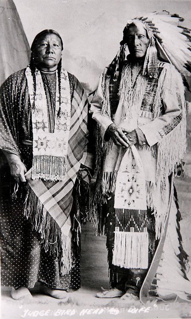 #13 Judge Bird Head and wife