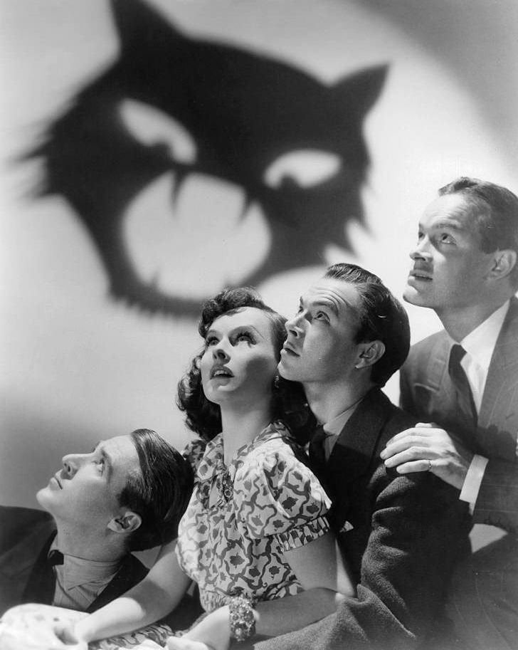 #55 Paulette Goddard with Douglas Montgomery and John Beal in the movie ‘The cat and the Canary’, 1939.
