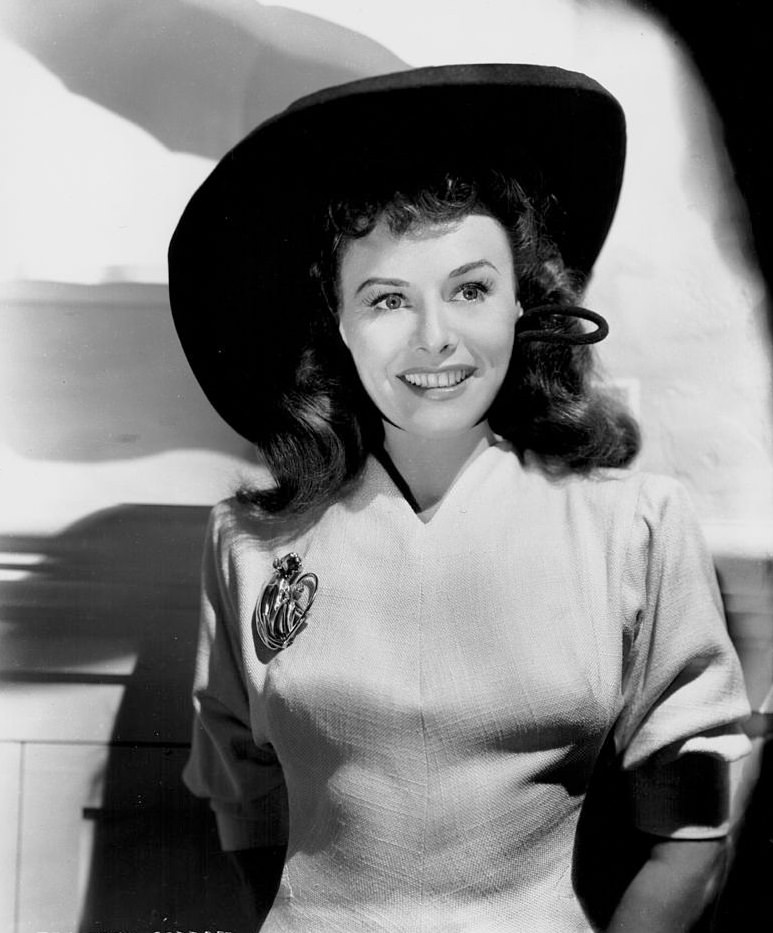 #13 Paulette Goddard wearing a wide brimmed hat, 1940.