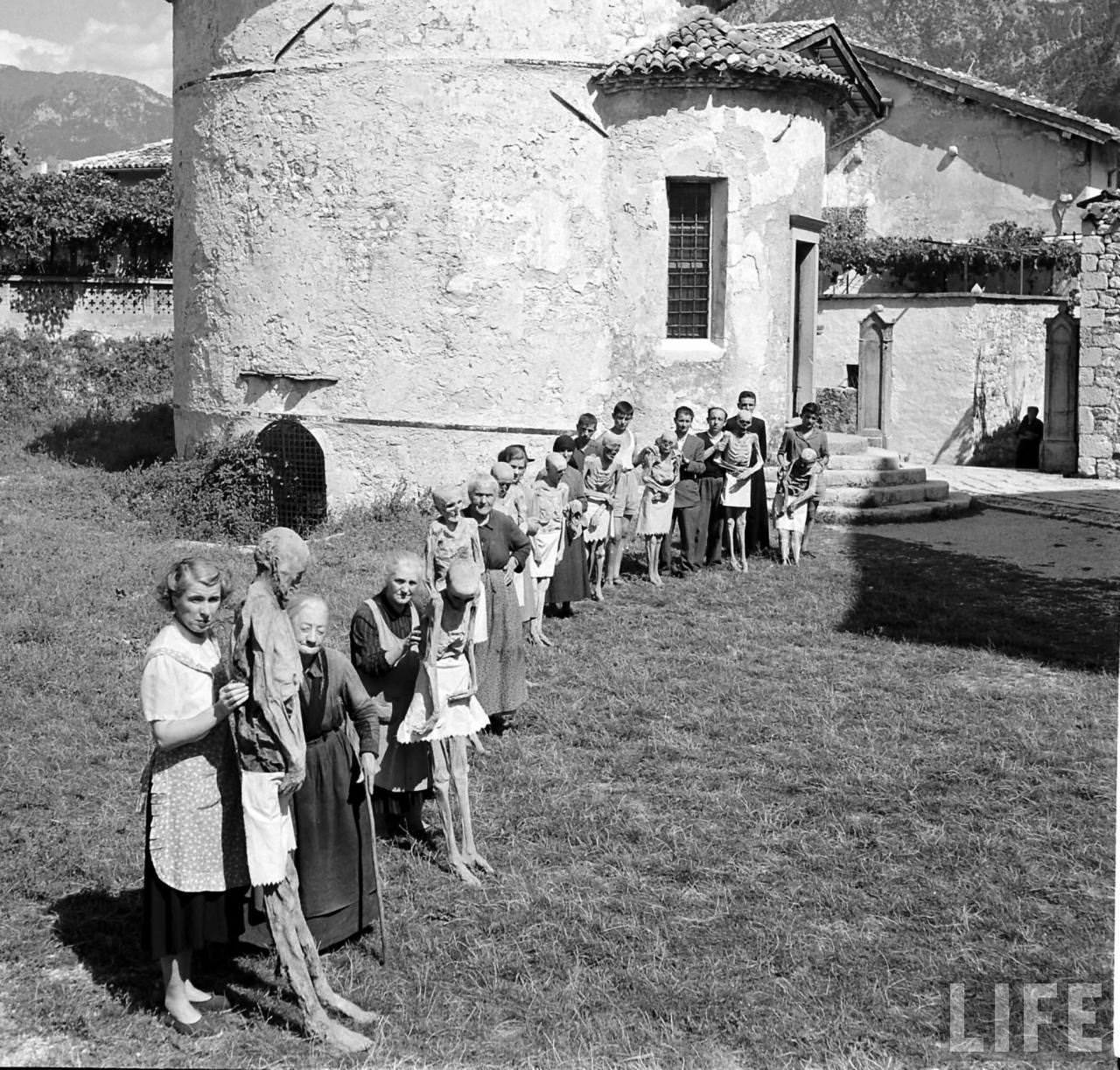 People Living with a Normal Life with Mummies in Venzone, Italy in 1950 Weird