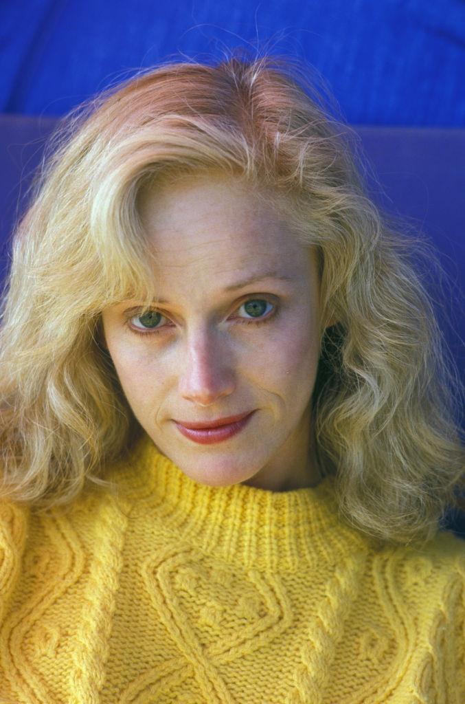 #38 Sondra Locke in yellow sweater, 1986.