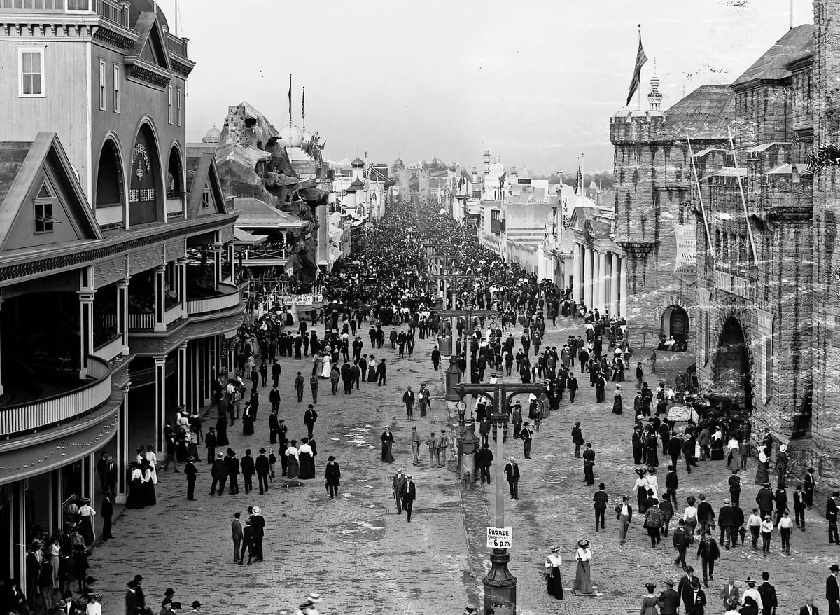 #26 A view of fair visitors crowding the Pike on Pike Day, June 4, 1904. The Pike was the main thoroughfare of amusement concessions at the fair.