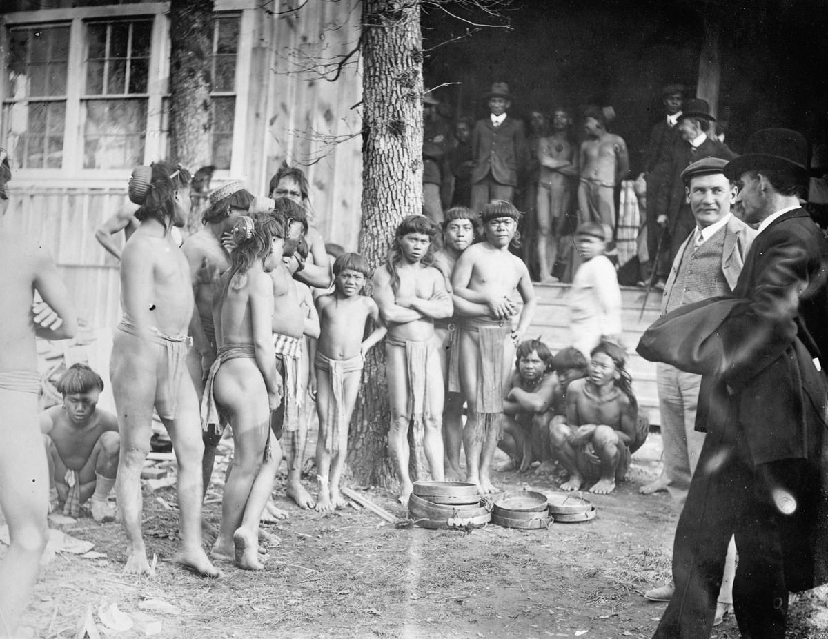 #72 Group of Bontoc-Igorrotes ‘Head-Hunters.