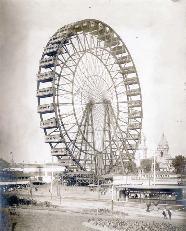 #52 Ferris Wheel at the 1904 World’s Fair. (Swedish Restaurant in foreground), 1904