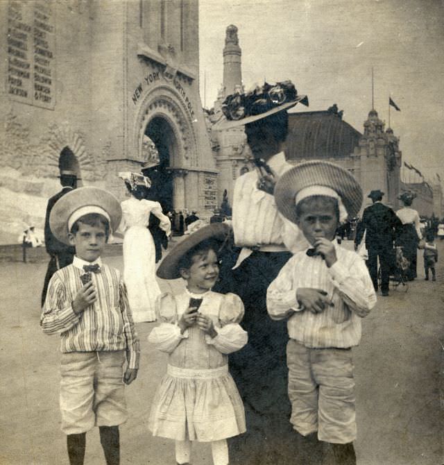 #61 Randolph Smith Lyon, Mildred Frances Lyon, Mrs. Montague Lyon (Frances Robnett Smith Lyon), Montague Lyon, Jr., eating ice cream cones at the 1904 World’s Fair, 1904