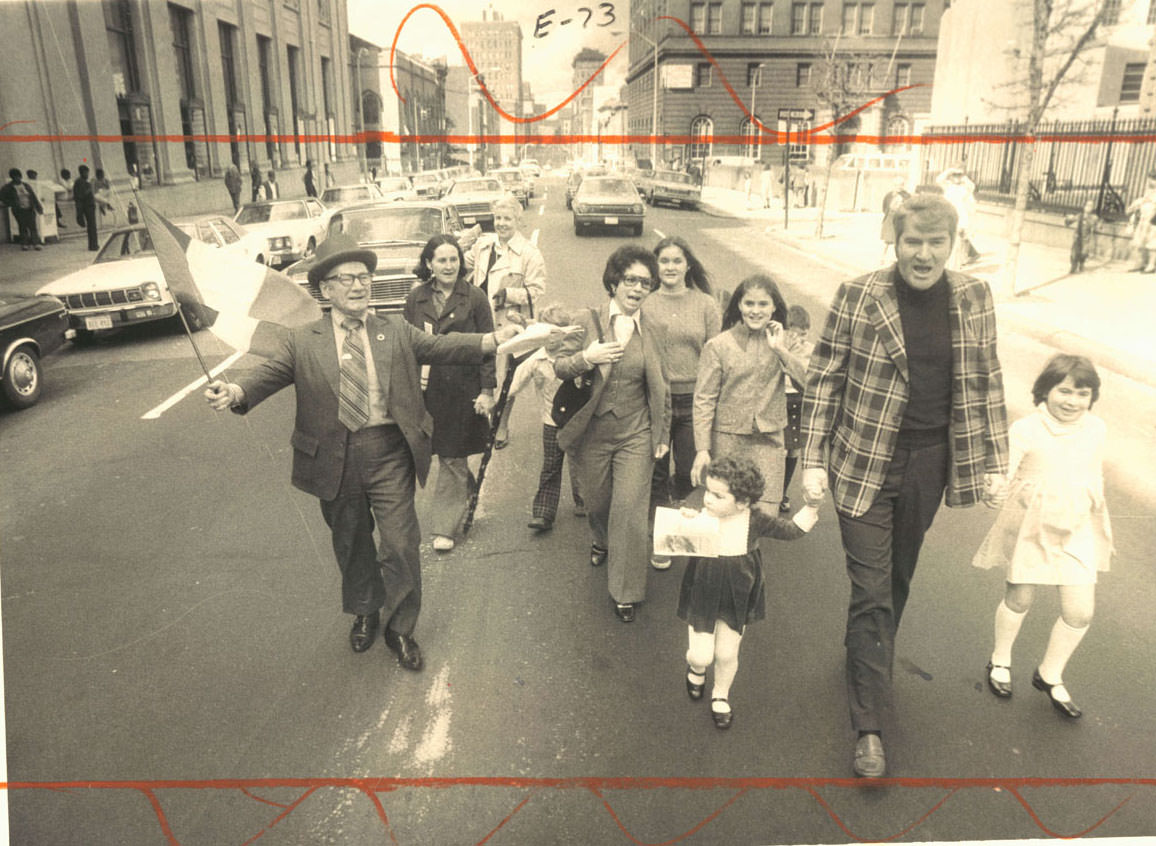 #6 That irrepressible Irishman, Hyman A. Pressman, who also works as the city comptroller, out bluffed the rain to lead his own small but enthusiastic St. Patrick’s Day parade down the traditional Cathedral street route.