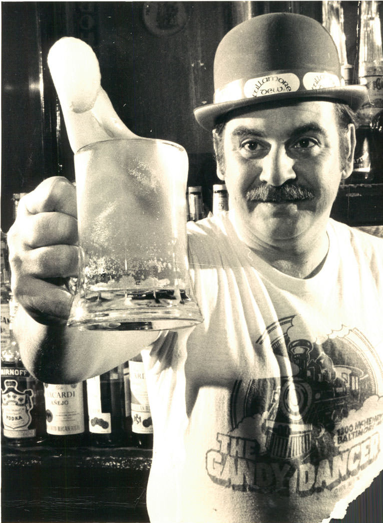 #8 Erin go slosh! With green suds flying, Noel Bautro toasts the advent of St. Patrick’s Day among fellow Irish-at-least-for-a-week at the Gandy Dancer in the 1300 block McHenry Street. March 1979