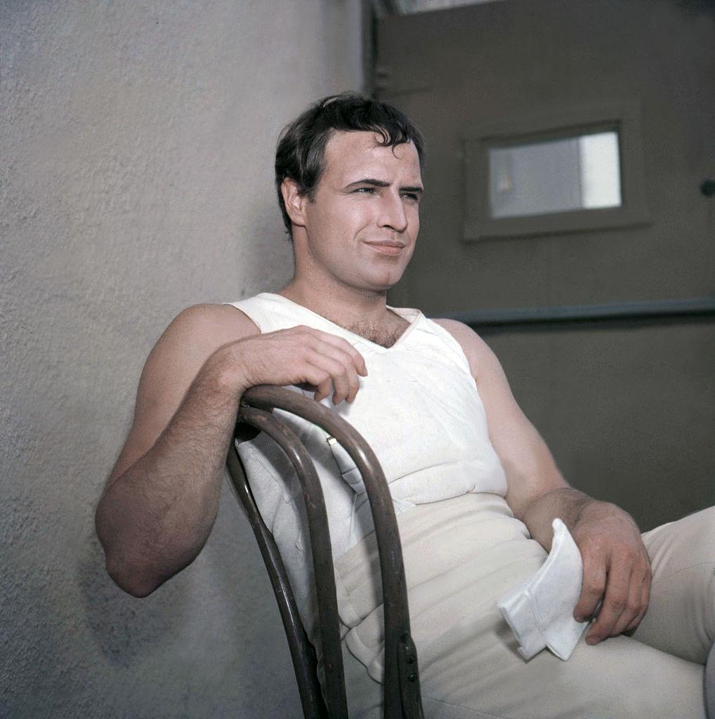 #25 Marlon Brando on the set of Desiree, 1960s.