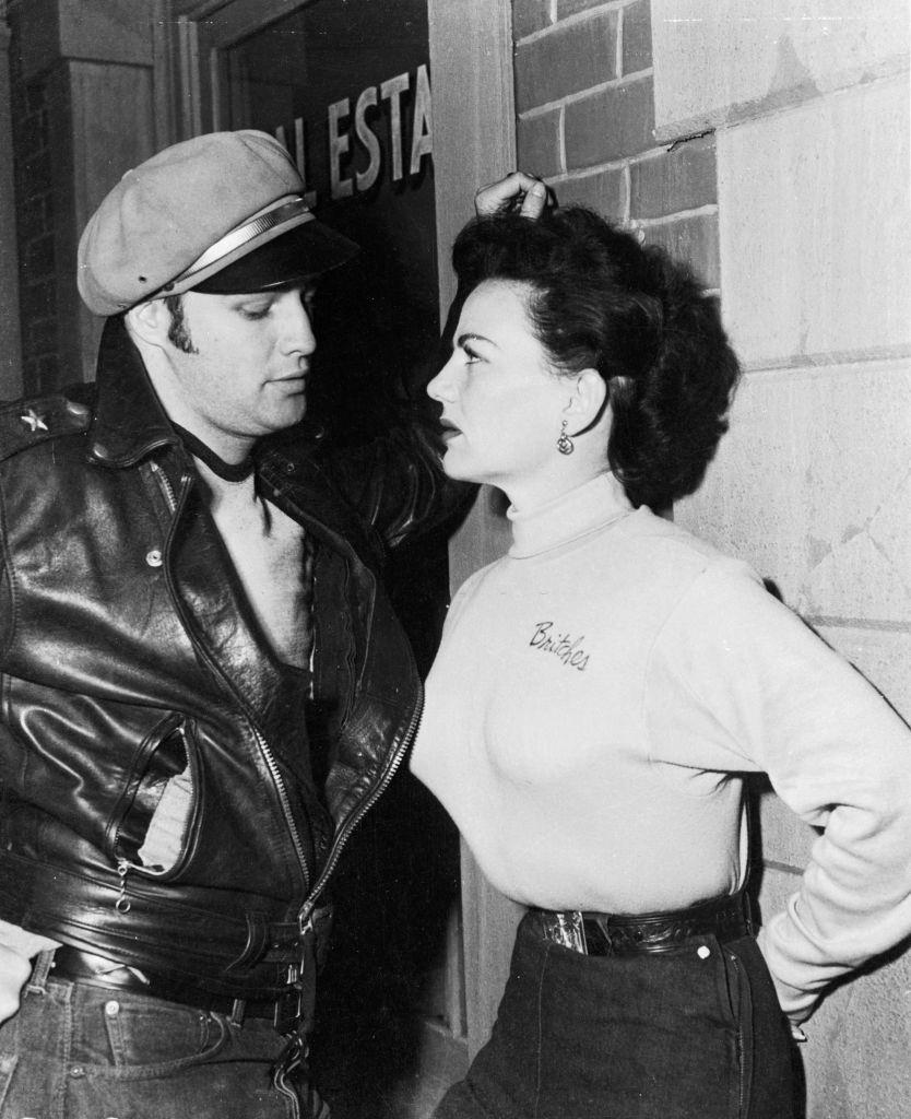 #20 Marlon Brando with Yvonne Doughty in a scene from the film ‘The Wild One’