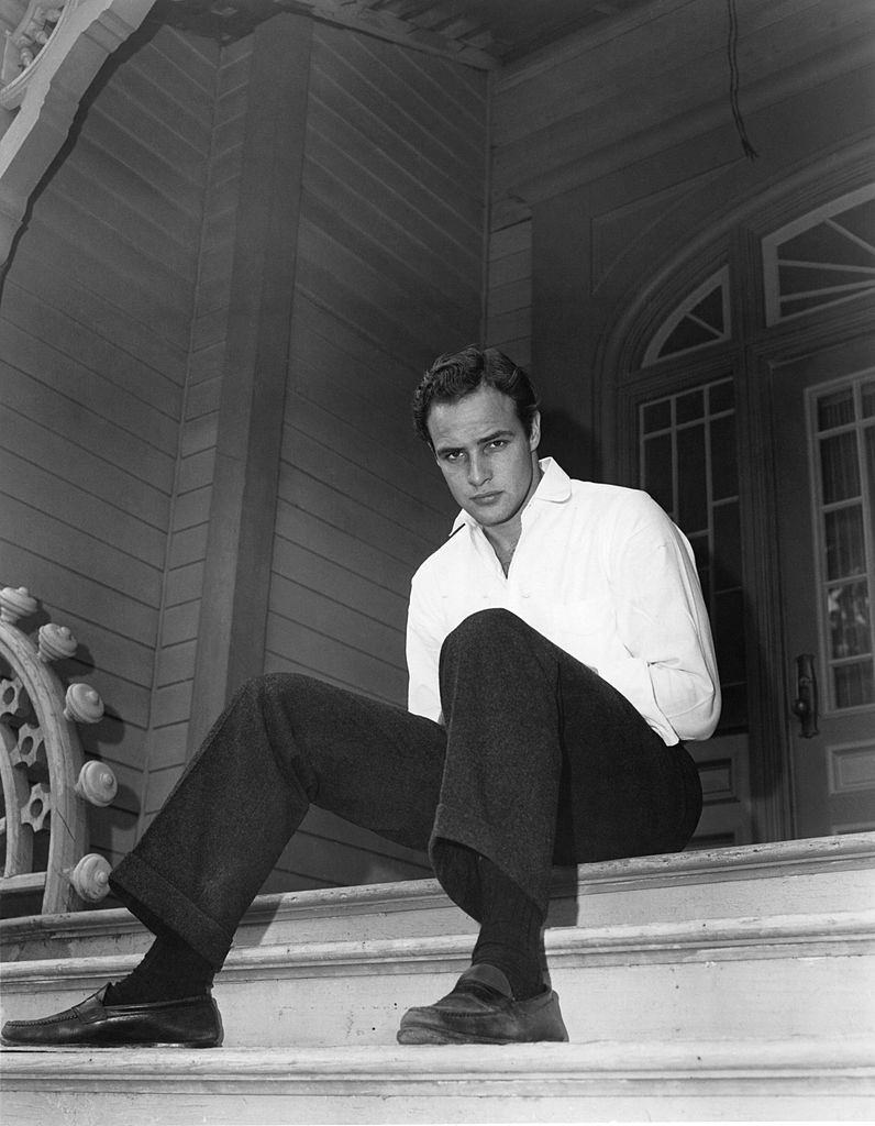 #63 Marlon Brando poses for a portrait, 1953.