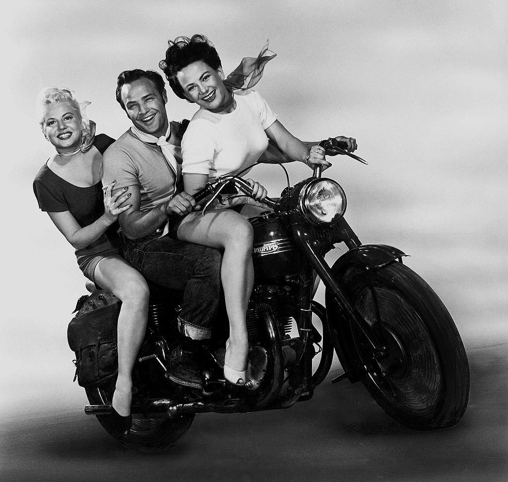 #65 Marlon Brando with Peggy Maley and Yvonne Doughty, 1953.
