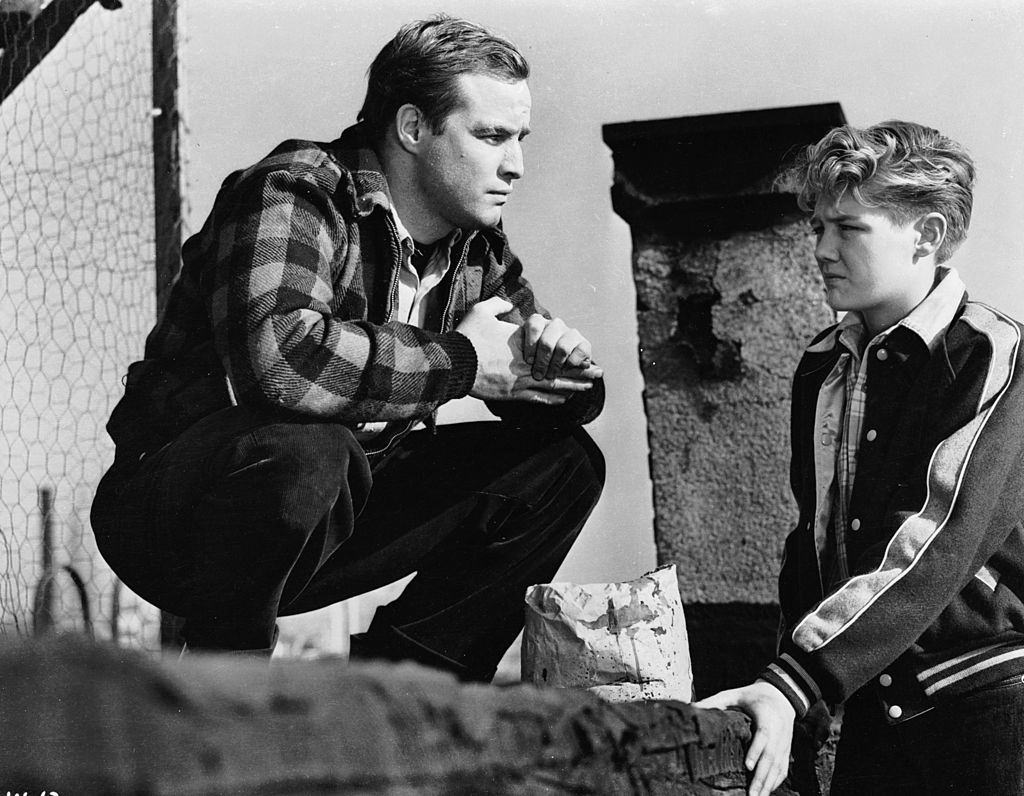 #68 Marlon Brando during the filming of ‘On The Waterfront’, 1954.