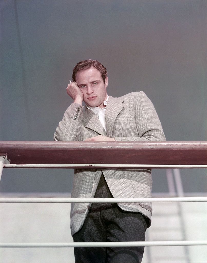 #3 Marlon Brando leaning on the parapet of a boat and posing, 1945.