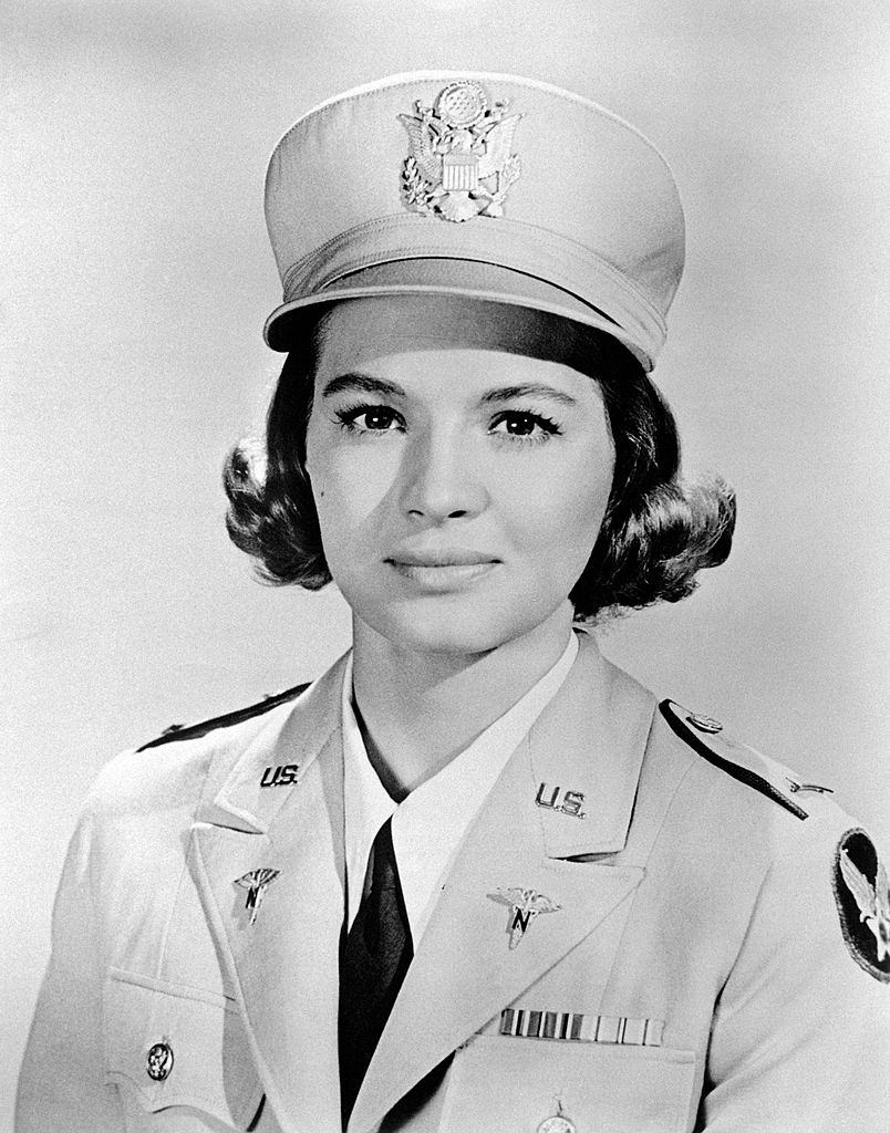 #41 Angie Dickinson posing on the set of Captain Newman, M.D.. Hollywood, 1963