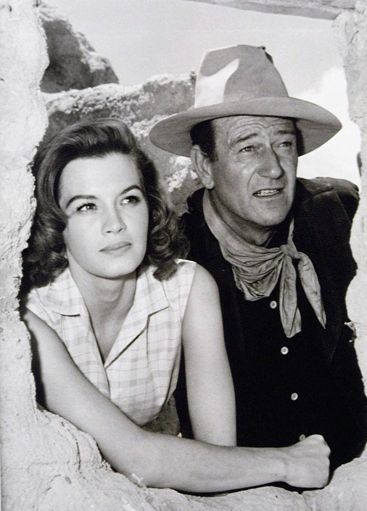 #42 Angie Dickinson and John Wayne on location at Old Tucson Studios in ‘Rio Bravo’, 1959.