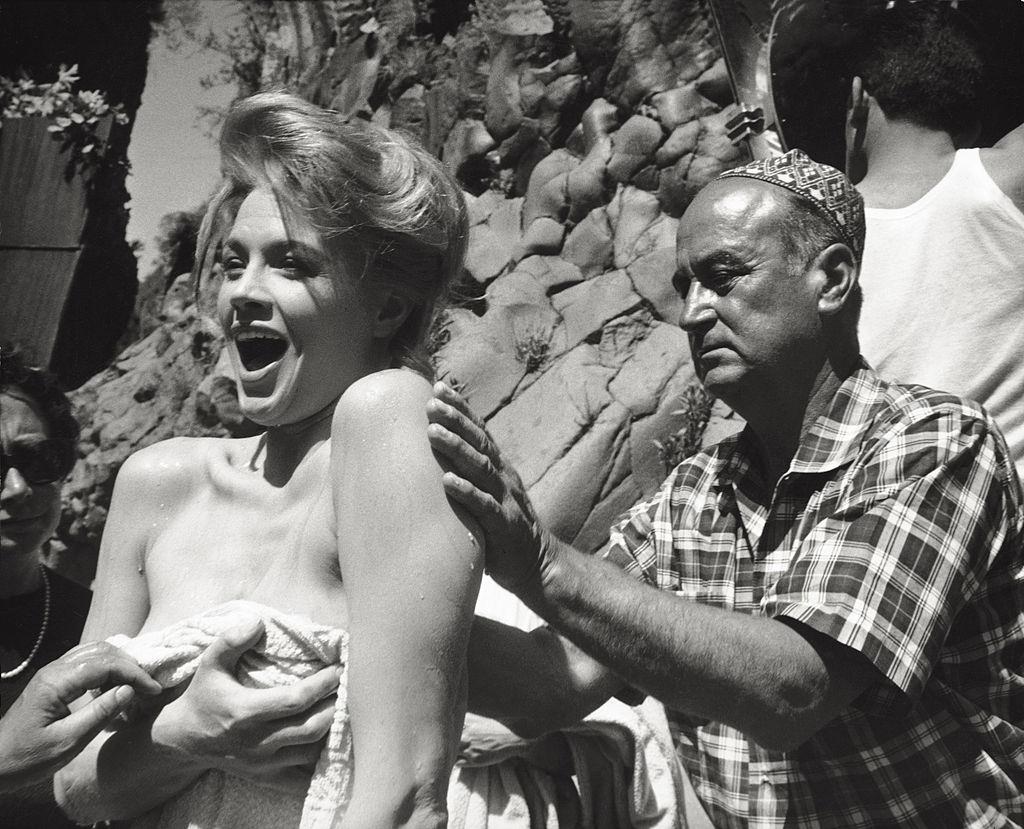 #56 Angie Dickinson taking massage, 1961.