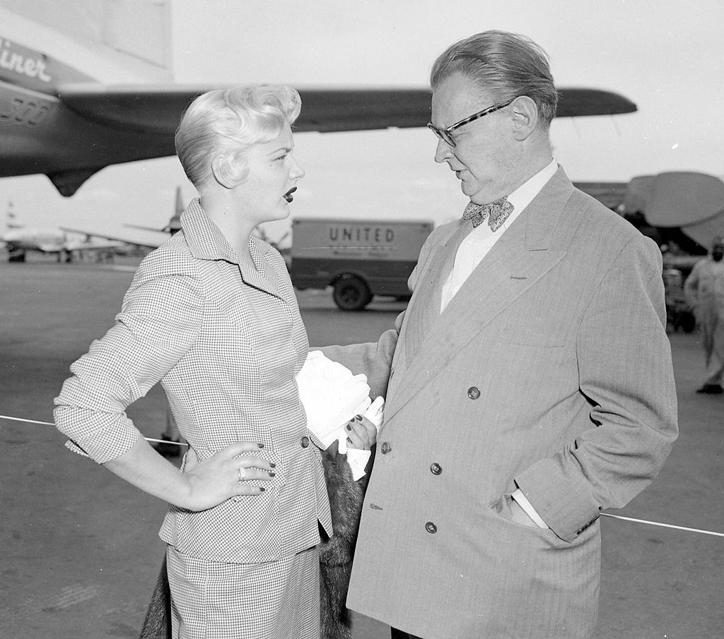 #25 Barbara Payton Terry Turner of RKO at LaGuardia Airport, 1951.