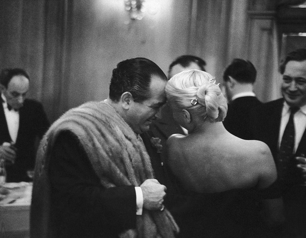 #30 Barbara Payton with prdocuer Alexader Paal at the Savoy Hotel, London, 1952.