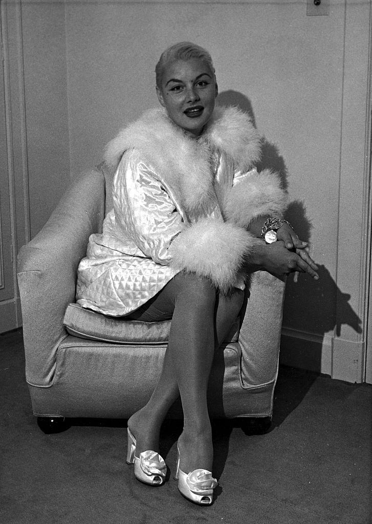 #39 Barbara Payton in her hotel room in London. 25th July 1952.
