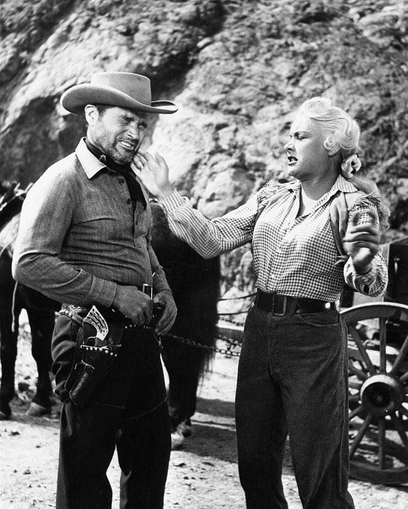 #52 Barbara Payton and Tom Neal in Scenes from ‘The Great Jesse James Raid’,1953.