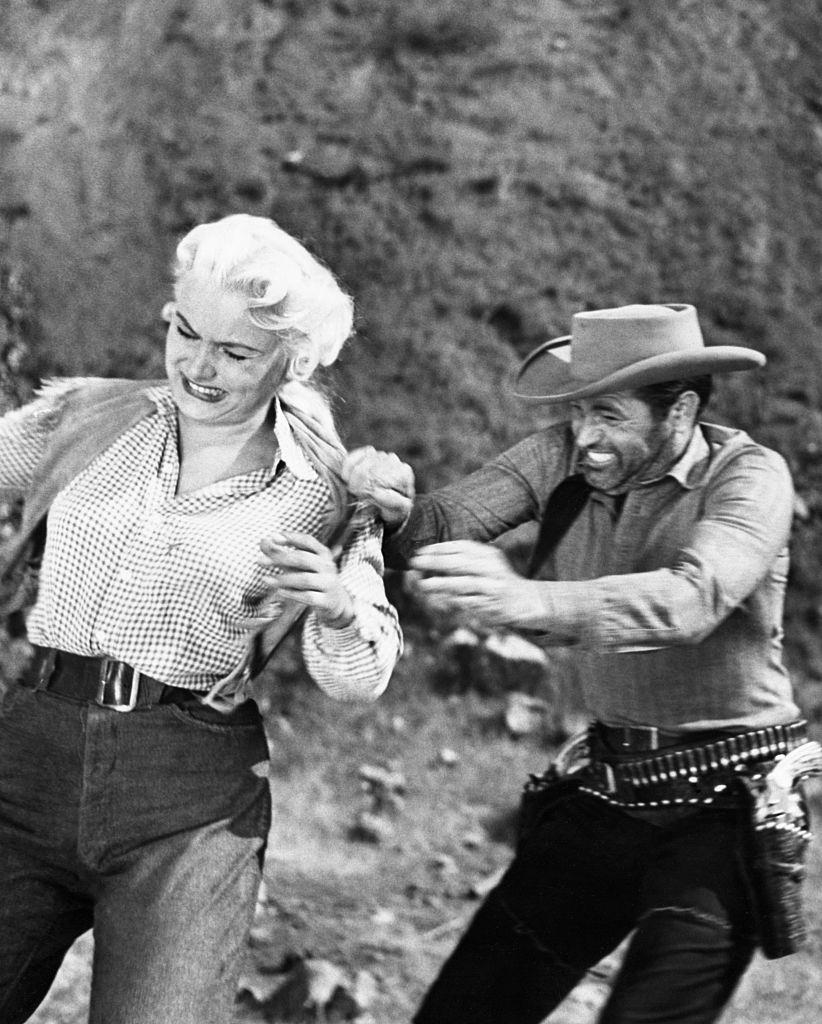 #54 Barbara Payton and Tom Neal in Scenes from ‘The Great Jesse James Raid’, 1953.
