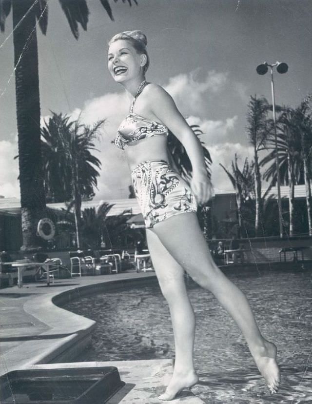 #60 Barbara Payton by the poolside, 1950.