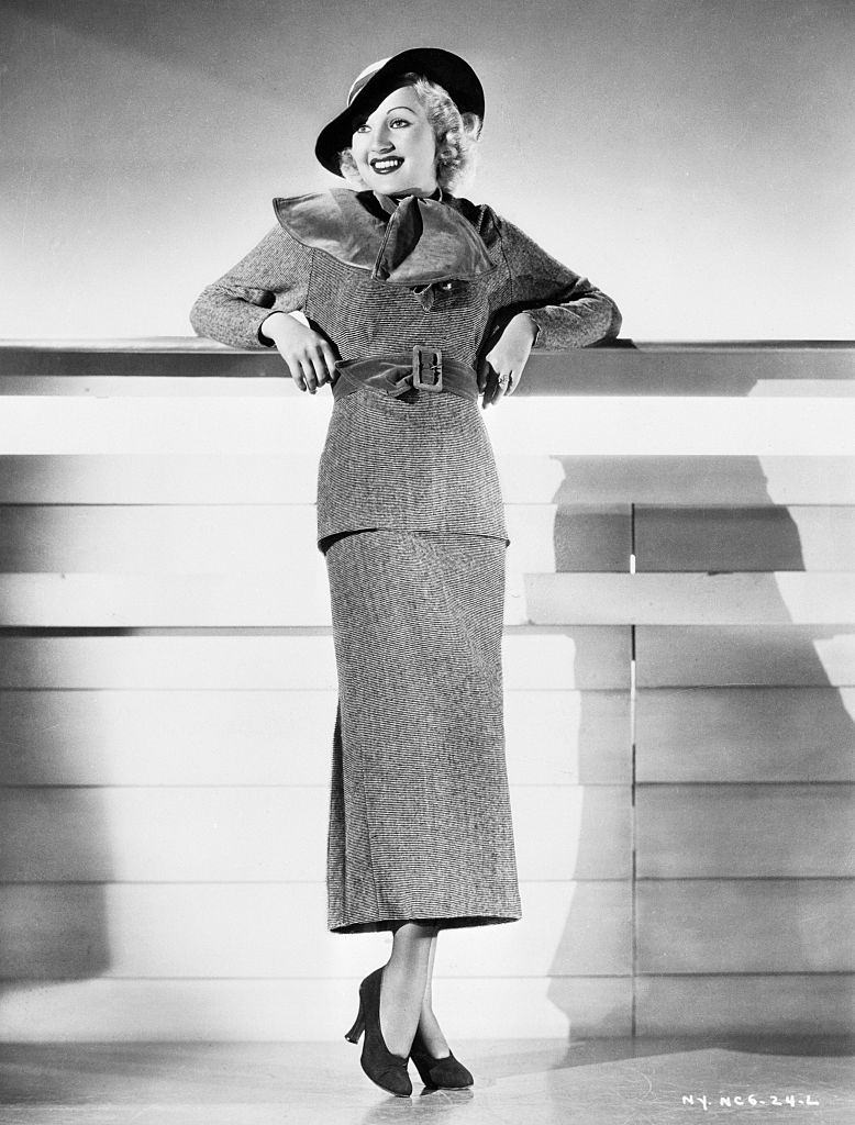 #67 Betty Grable in wool sports dress in black and white pin stripes, 1934.